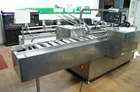封盒機不懼困難勇敢前進
